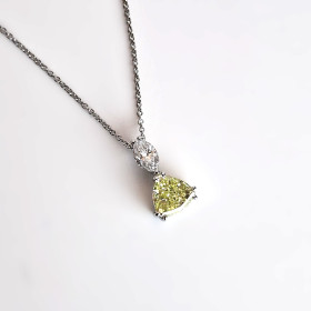         Weißgold, Halsschmuck, Catherine Sauvage Collier 004-5029 750/-WG 1 Diamant G/VS und 1 Diamant fancy yellow SI2 Kettenlänge ca. 44 cm 004-5029